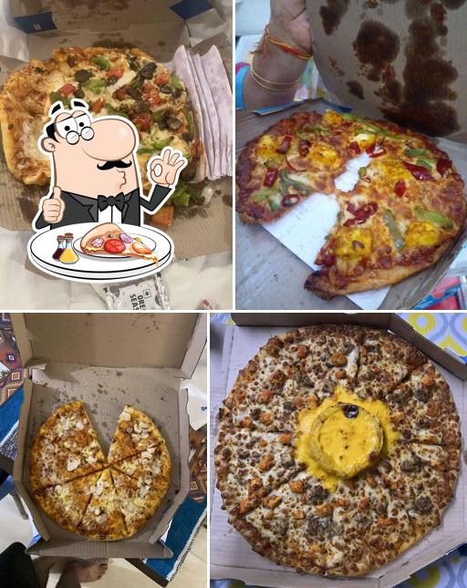 Pick pizza at Domino's Pizza