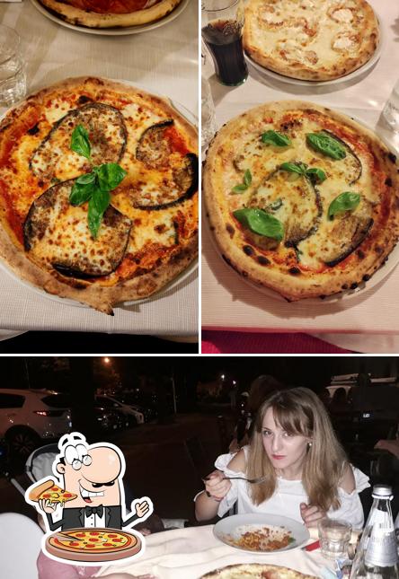 A Pizzeria Ristorante La Rocca, puoi assaggiare una bella pizza