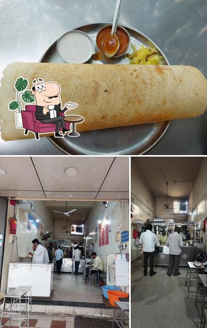 This is the picture depicting interior and food at Appa Refreshment