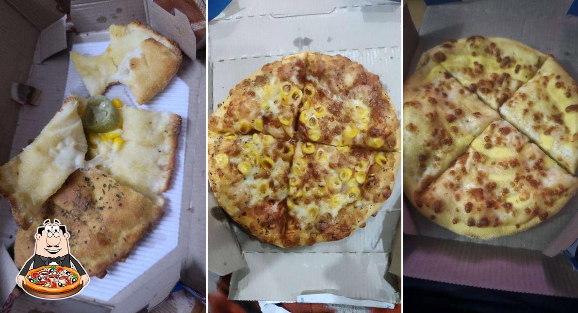 At Domino's Pizza Bisrakh Jalalpur, Greater Noida, you can try pizza
