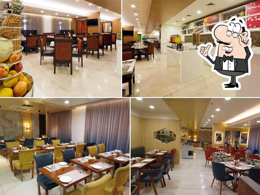 Take a seat at one of the tables at Zuma Restaurant