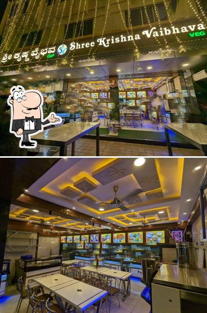 Take a seat at one of the tables at Shree Krishna Vaibhava