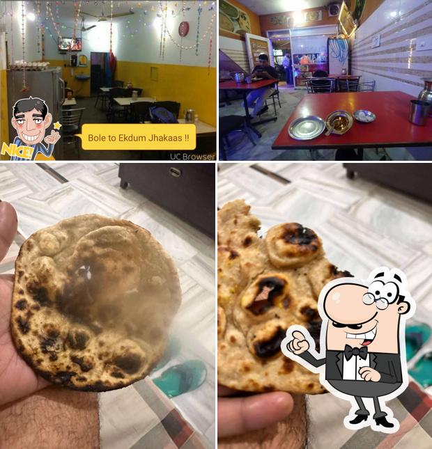 Check out the image showing interior and food at New Bhangu Dhaba