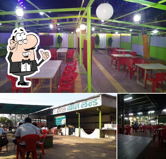 Take a seat at one of the tables at Greenland Hotel