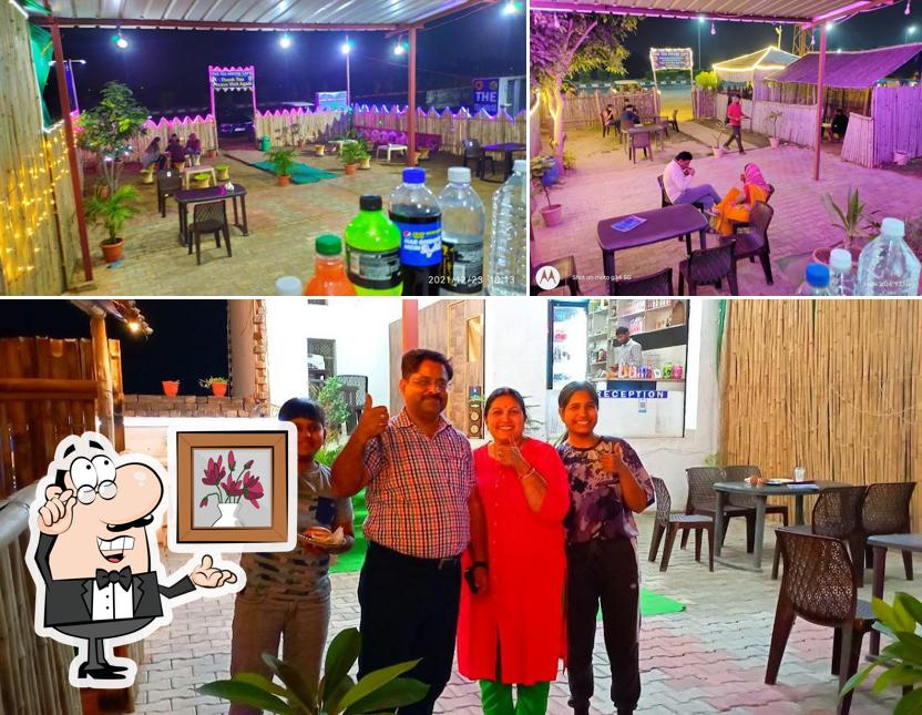 Take a seat at one of the tables at THE TEA HOUSE CAFE