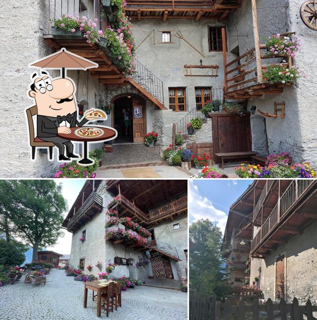 Puoi goderti l'aria fresca da seduto all'esterno di Agriturismo Barba Gust