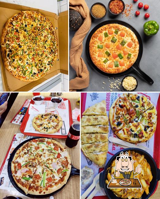 Order pizza at Pizza Galleria Guna