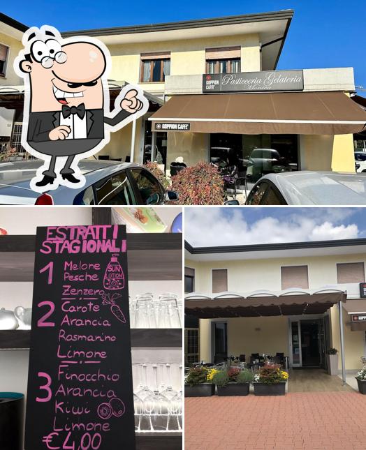 Dai un’occhiata alla foto che presenta la esterno e lavagna di Pasticceria Gelateria Monica