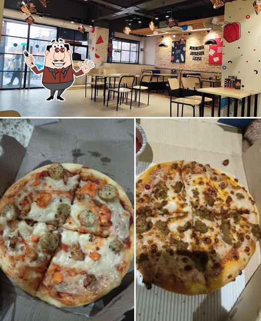 The image of Domino's Pizza Hotel Royal Star, Sahibzada Ajit Singh Nagar’s food and interior