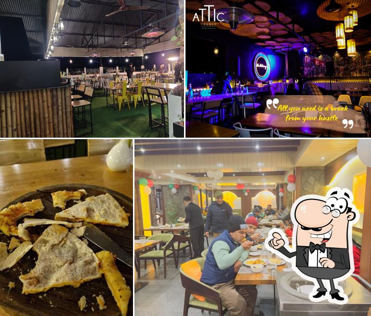 Take a seat at one of the tables at The Attic Lounge