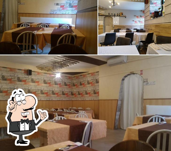 Siediti a un tavolo di La Pizza Di Cittavecchia