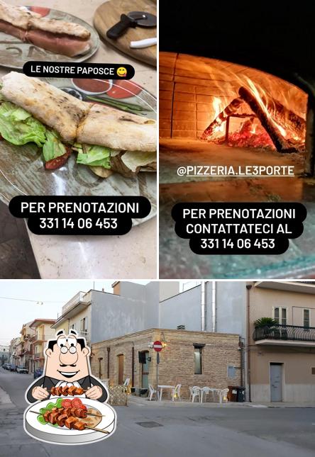 Guarda la immagine che mostra la cibo e esterno di Le Tre Porte