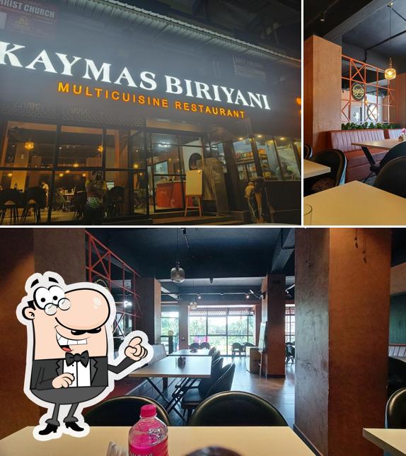 Take a seat at one of the tables at Kaymas Biriyani