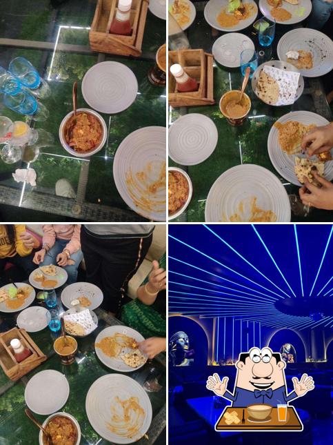 Check out the picture depicting food and interior at The Soho Garden by The Terrace