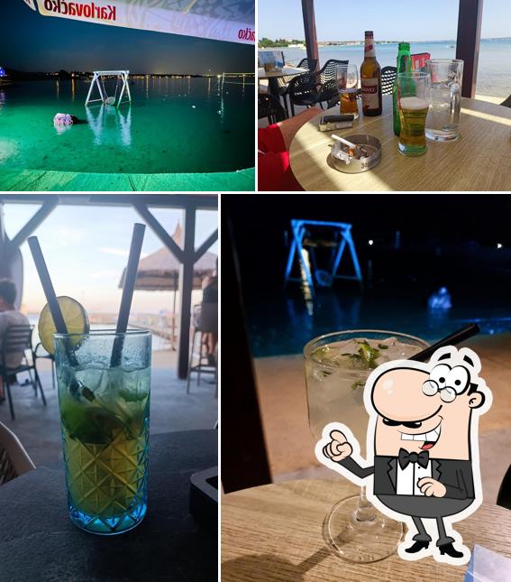 Puoi goderti l'aria fresca da seduto all'esterno di Beach Bar Barufa