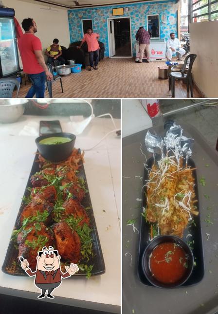 This is the picture depicting food and interior at New Ajmeer Maharaja Hotel