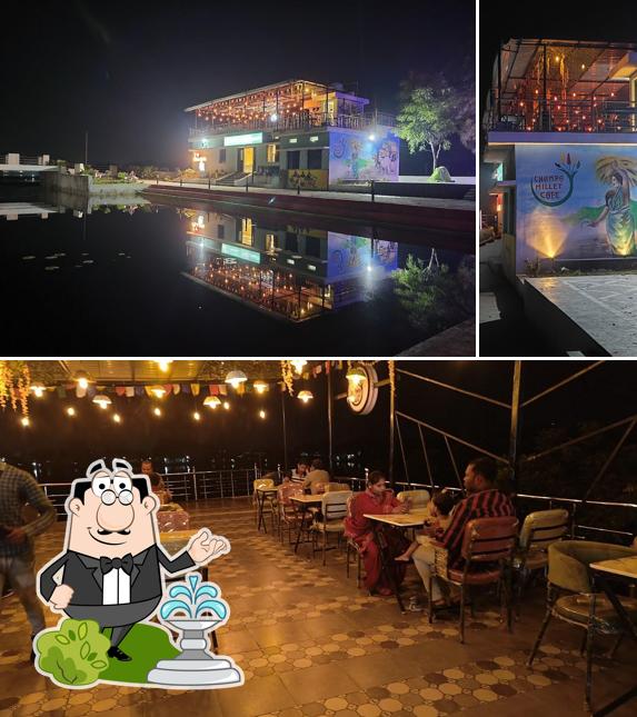 Check out the picture displaying exterior and interior at Champa millet cafe
