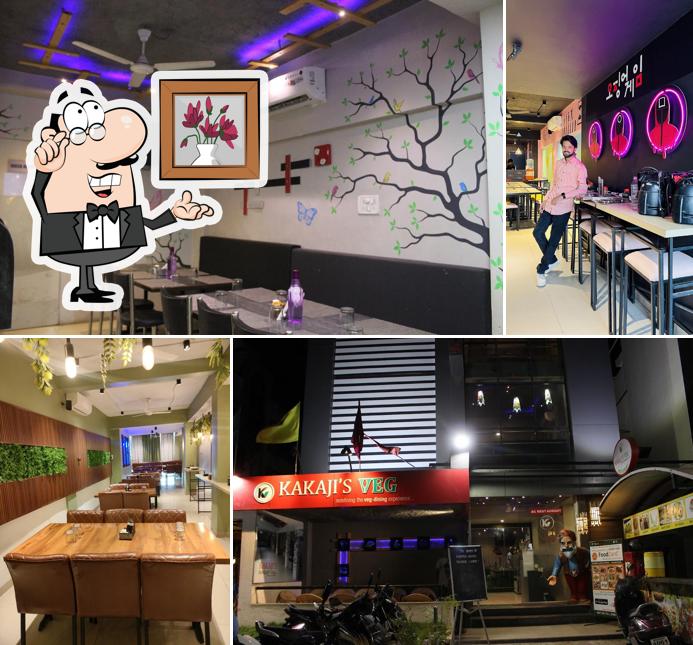 Take a seat at one of the tables at Kakaji's Veg