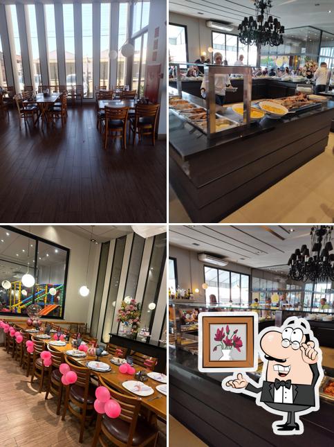 Sente em uma das mesas no Buchi Churrascaria e Pizzaria