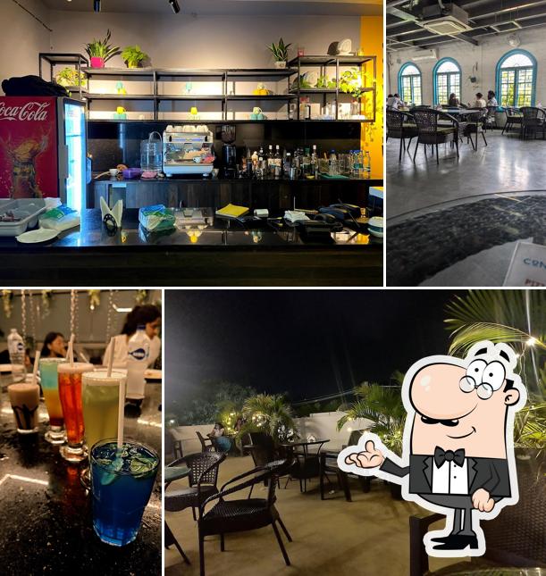 Take a seat at one of the tables at V Hangout Resto Cafe