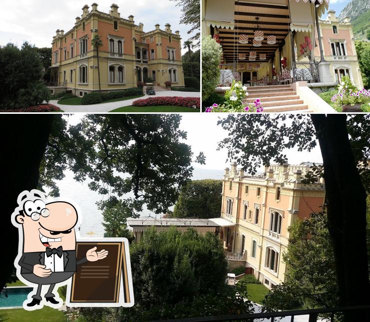 Puoi goderti l'aria fresca da seduto all'esterno di Grand Hotel a Villa Feltrinelli