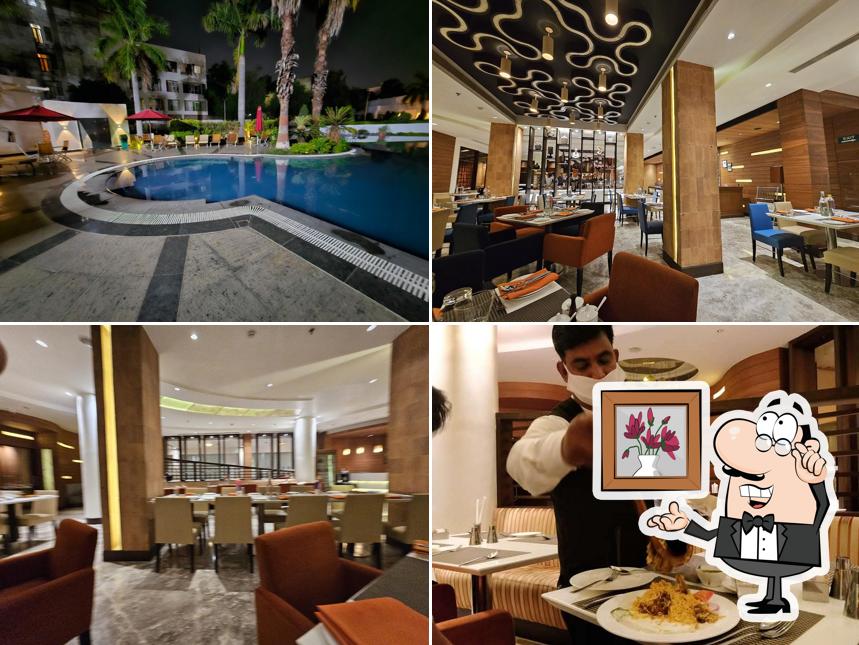 The interior of The Palate Restaurant at Ramada Plaza by Wyndham JHV Varanasi