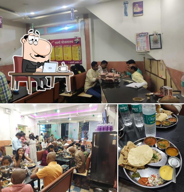 This is the photo depicting interior and food at Laxmi Bhojnalaya
