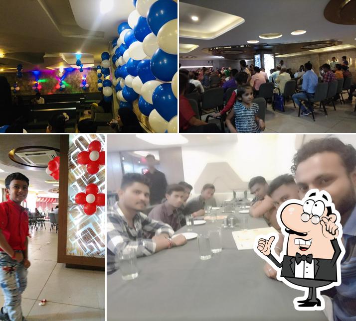 Take a seat at one of the tables at Capricorn Restaurant-2