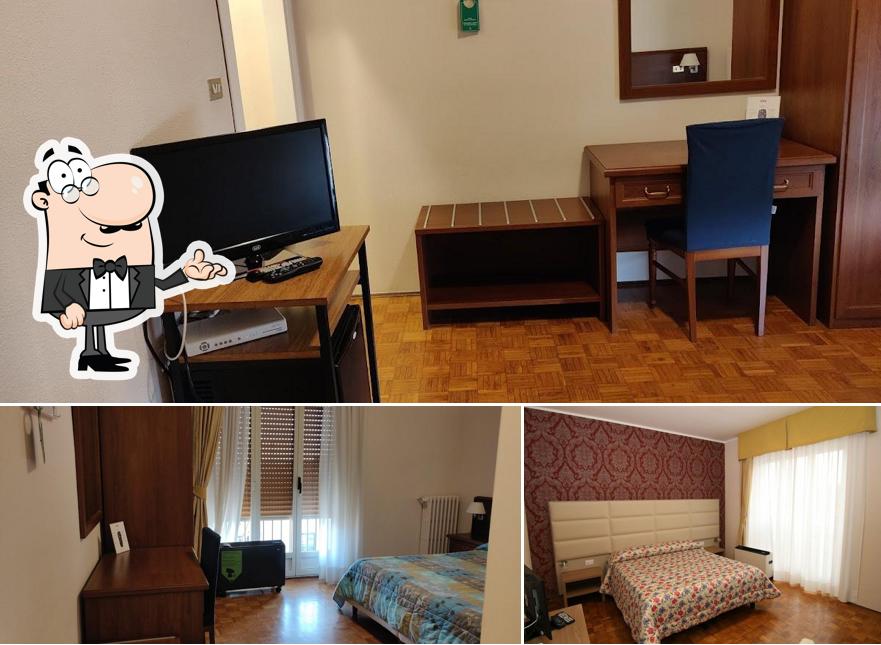 Siediti a un tavolo di Albergo Ristorante Vittoria