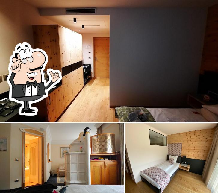 Siediti a un tavolo di Hotel Goldener Adler