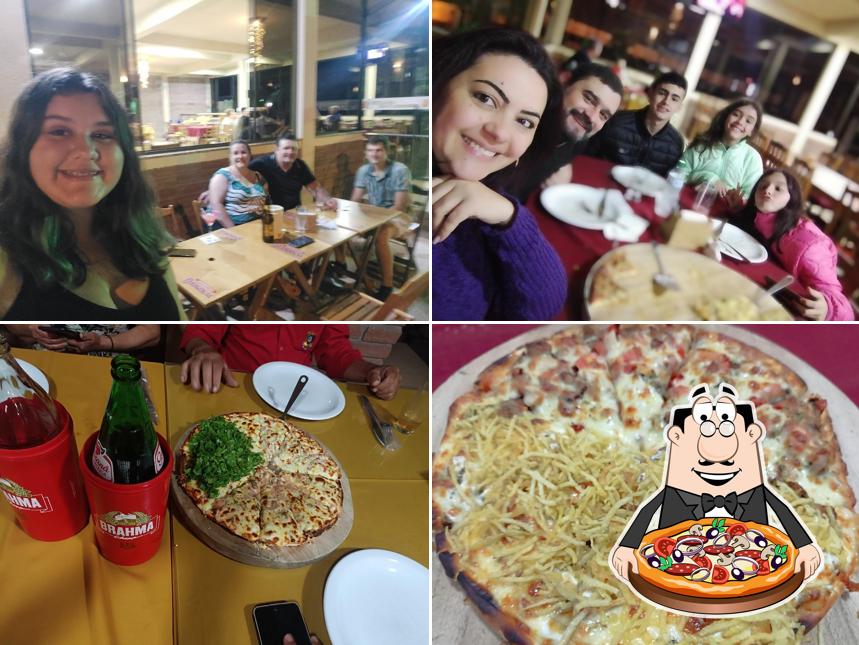 Consiga pizza no Pizzaria Casa de Pedra
