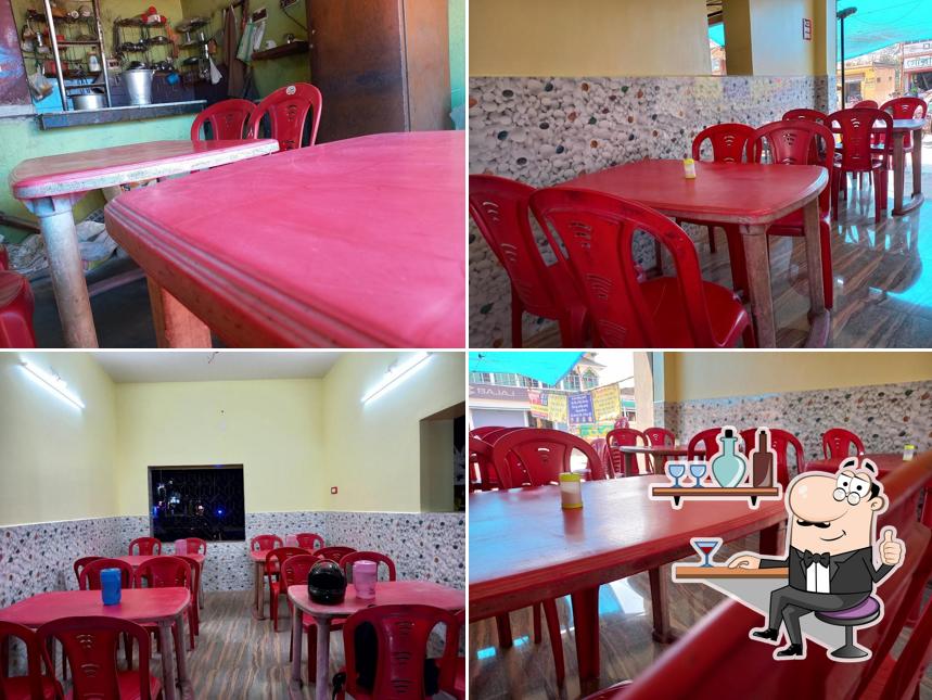 Take a seat at one of the tables at Atithya restaurant