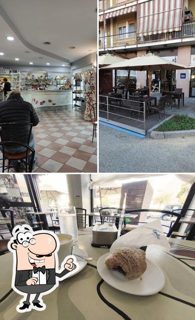 Guarda la immagine che raffigura la interni e cibo di Popi's Caffé