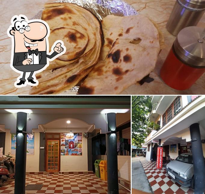 The photo of Delhi wala restaurant(Pure Veg)’s exterior and food