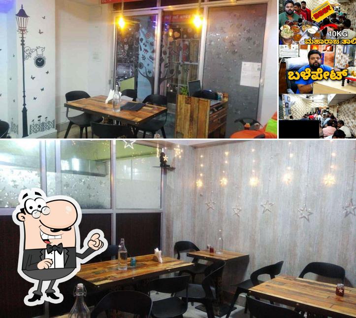 This is the image displaying interior and food at Kapoors Punjabi Restaurant