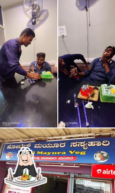 This is the image displaying food and exterior at Hotel Mayura