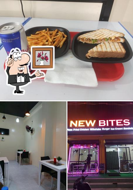This is the photo depicting interior and food at NEW BITES