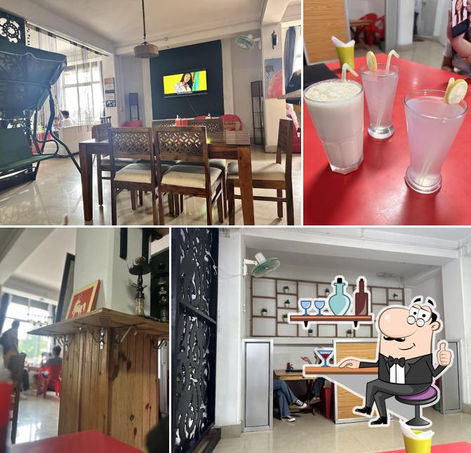 Take a seat at one of the tables at De' White Chilli