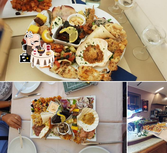 Tra le diverse cose da Alchimia Ristorante Pizzeria Bar si possono trovare la cibo e interni