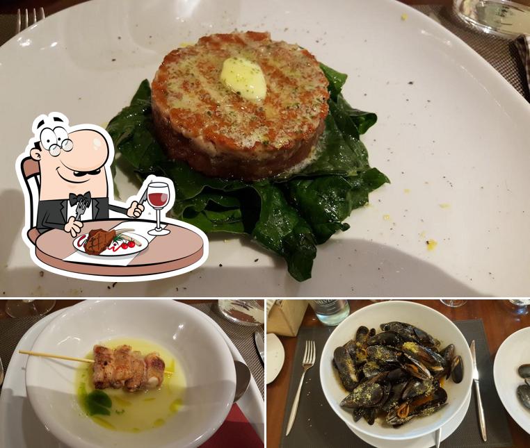 Ordina i un pasto a base di carne a Enotavola Pino