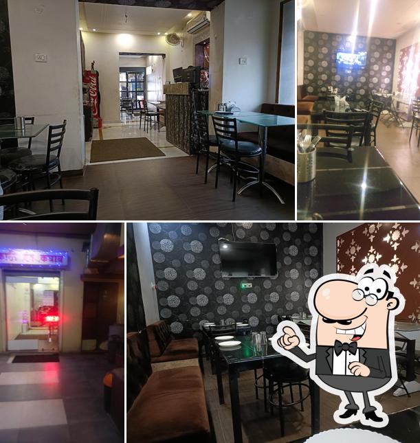 Take a seat at one of the tables at Kathi N Kabab