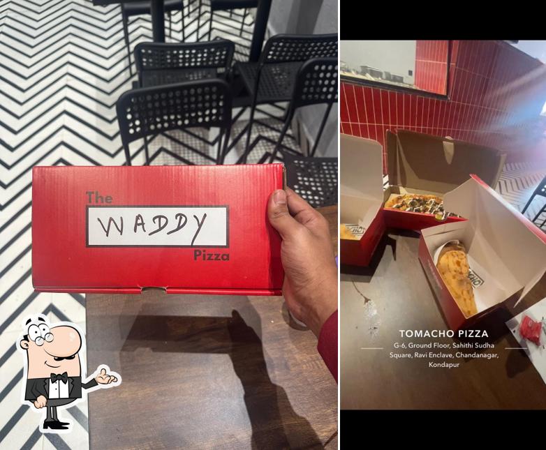 The interior of Tomacho Pizza