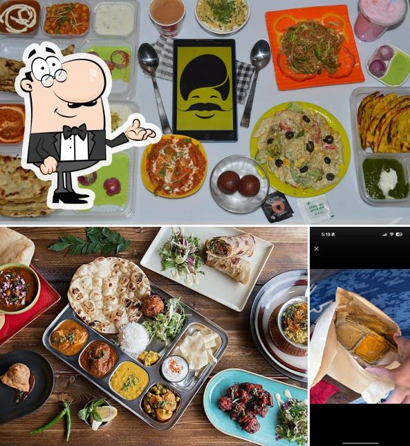 Check out the photo depicting interior and food at Thaaliwalaa