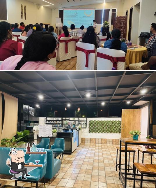 Take a seat at one of the tables at Sitara Rooftop Cafe