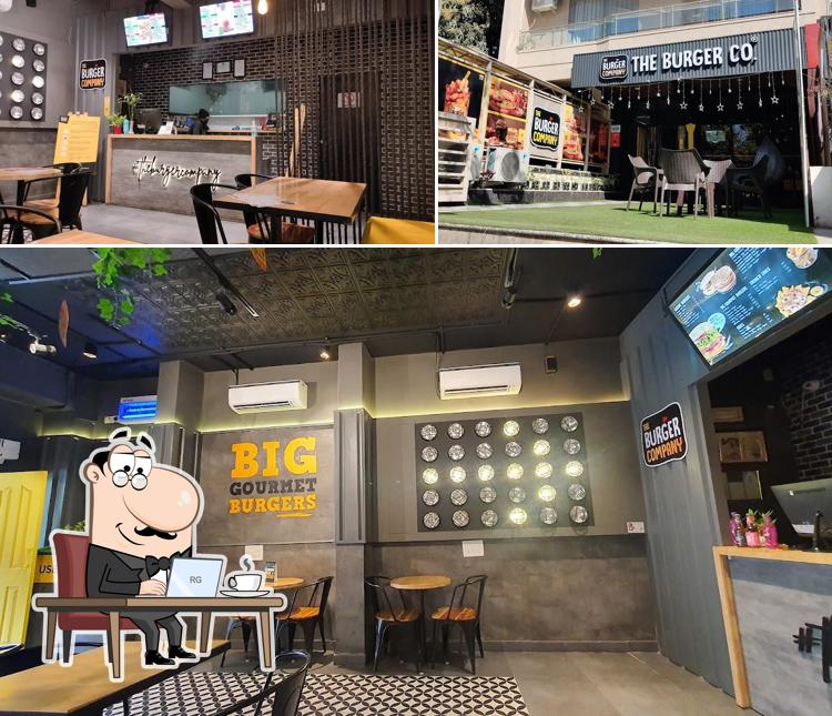 Take a seat at one of the tables at THE BURGER COMPANY