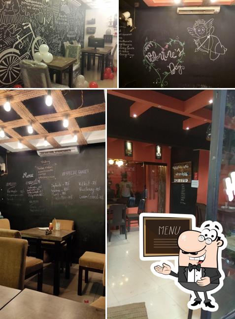 Cafe Coffee @ MC Road is distinguished by blackboard and interior
