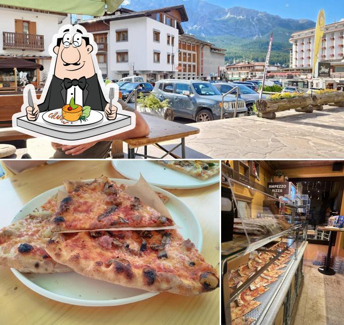 Dai un’occhiata alla immagine che mostra la cibo e esterno di Ampezzo pizza