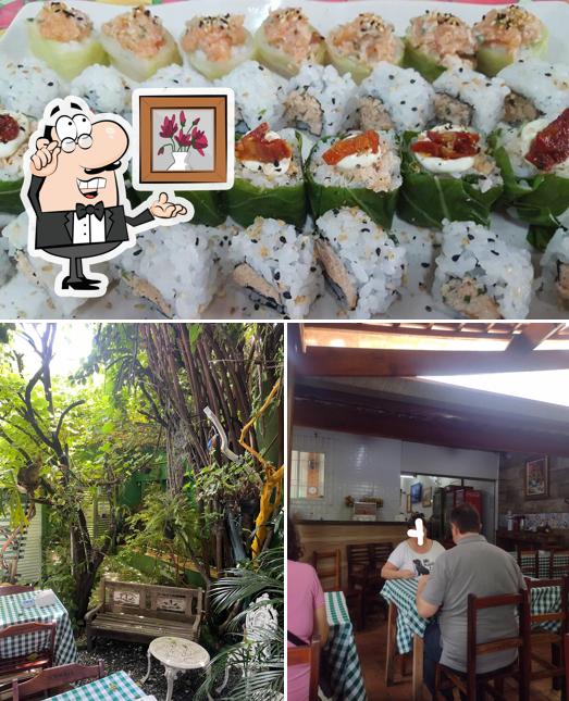 A foto do Restaurante do Romano’s interior e comida