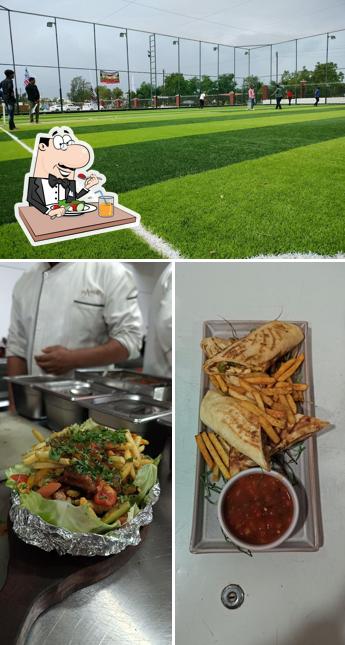 This is the picture depicting food and exterior at Manav Square