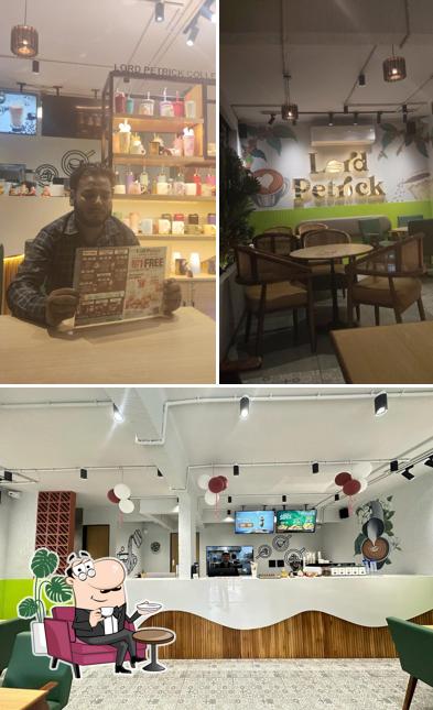 Take a seat at one of the tables at Lord Petrick Coffee & Burger-Parvat Patiya, Surat,